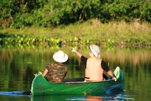 An enthusiastic tourist points out the wildlife in Southern Pantanal. 
