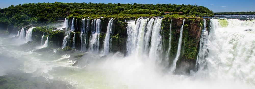 Huge fast flowing cascades at Iguassu falls. 