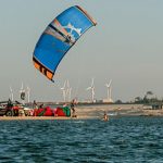 Learning how to body drag, a step in kitesurf training.
