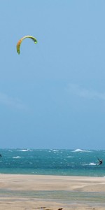 Long distance shot of kites belonging to kitesurfers in Cumbuco.